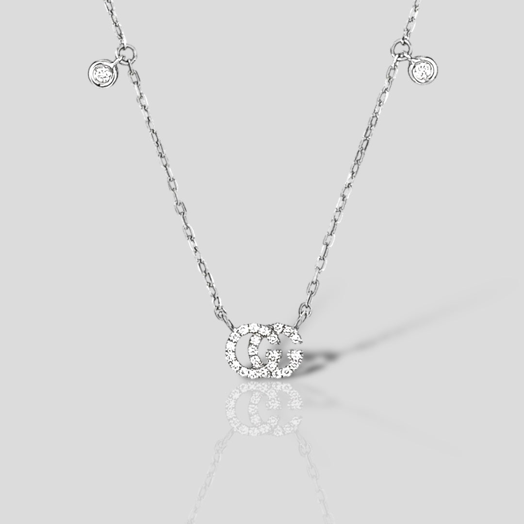 Collar GG Run Oro Blanco 18K y Diamantes. Mod:YBB479231001