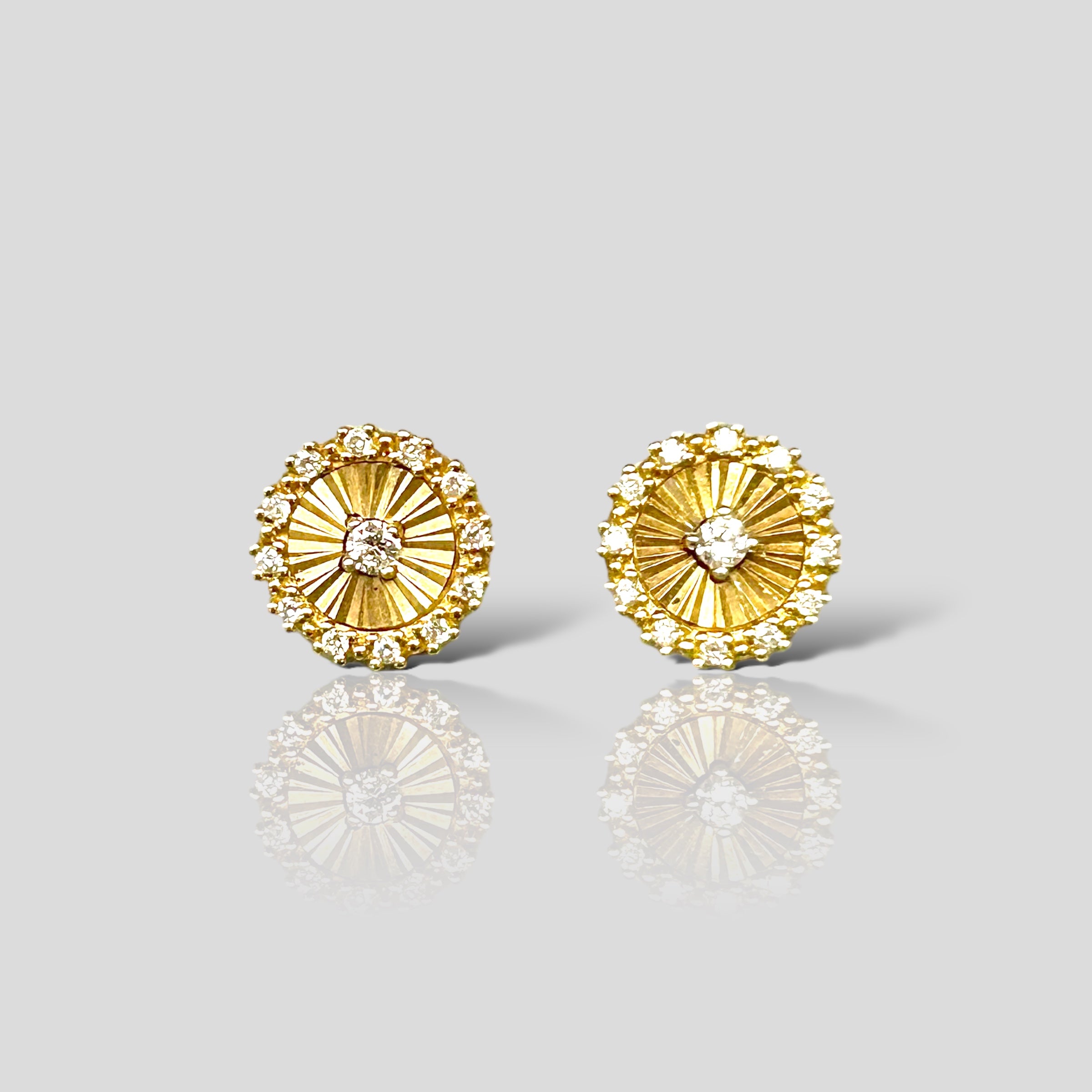 Broqueles 18K y brillantes 02.3846.2.014